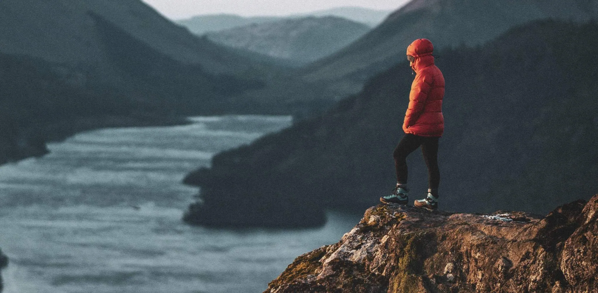 Man In Red Coat on Cliff Edge.jpg