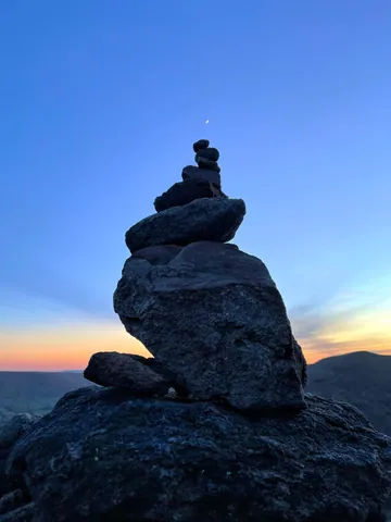 Cairn at Sunset on Kinder Scout Hike